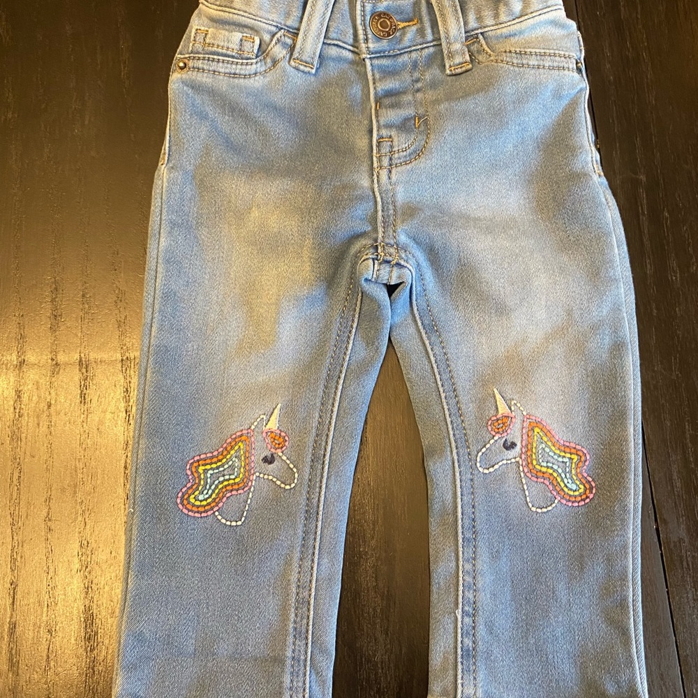 Cat and jack jeans with embroidered unicorns on the knees